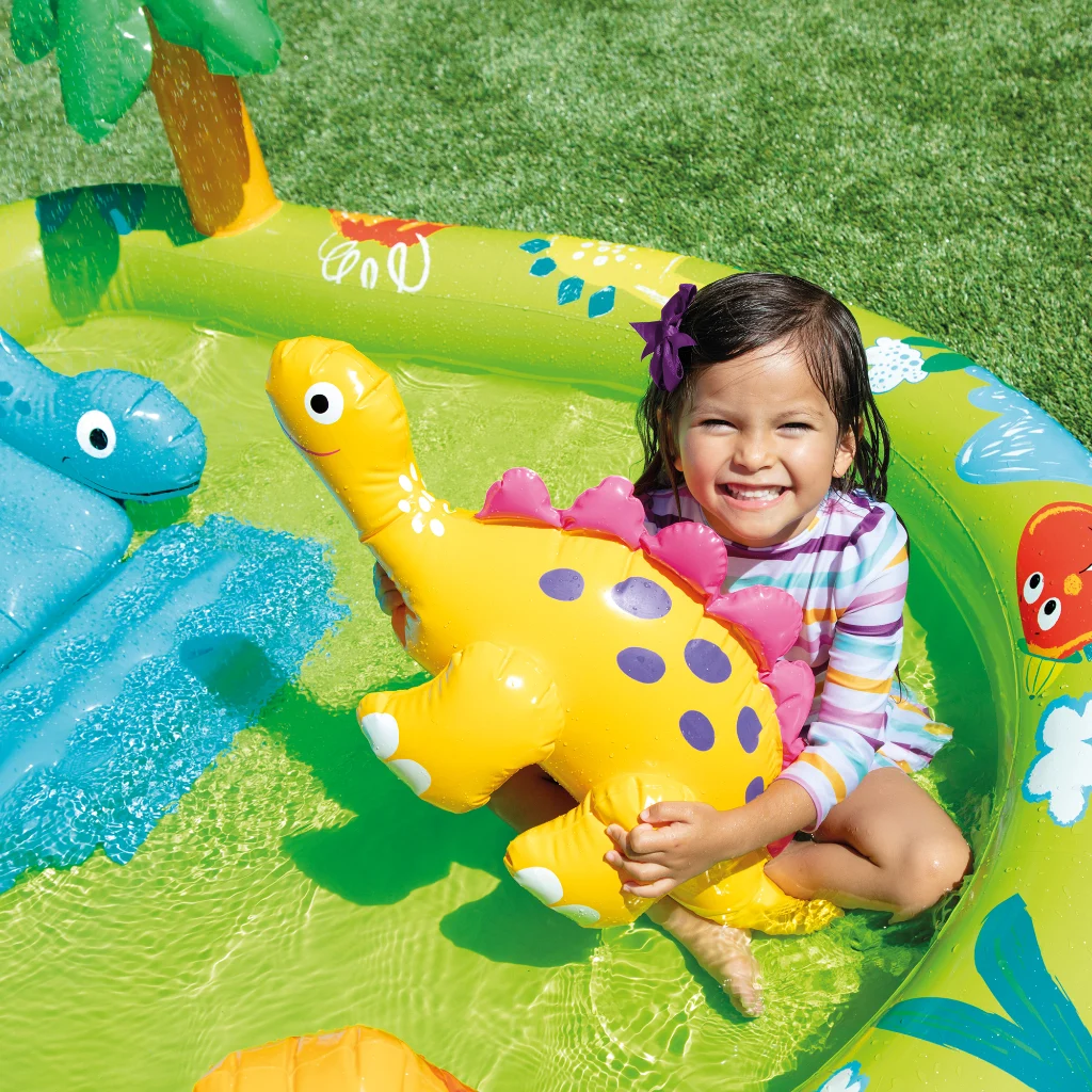 Little Dino – djeca na toboganu i palma-tuš